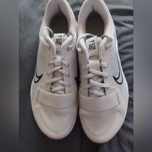 Off White Nike Athletic Shoes with Black Logo